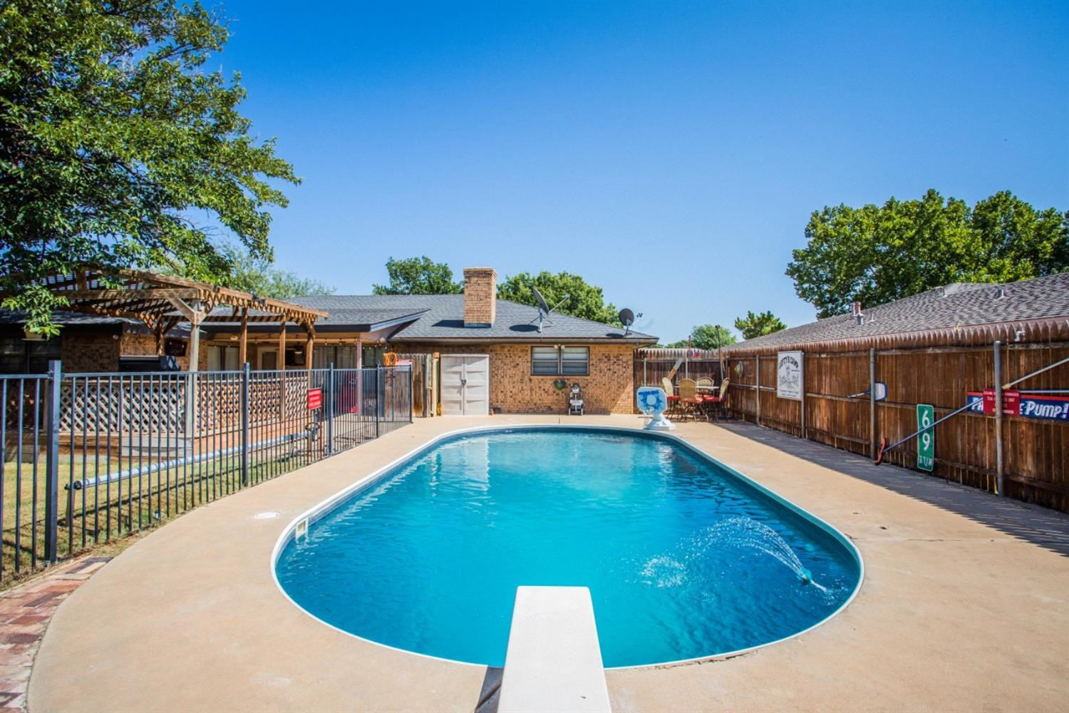 2118 Tech Drive Levelland, TX 79336 - Photo 29 of 42 a view of a swimming pool with a patio