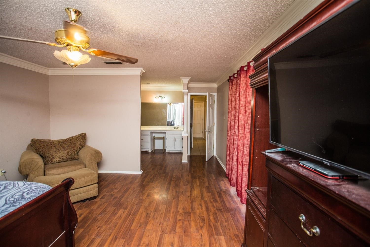 2118 Tech Drive Levelland, TX 79336 - Photo 39 of 42 a living room with furniture and wooden floor