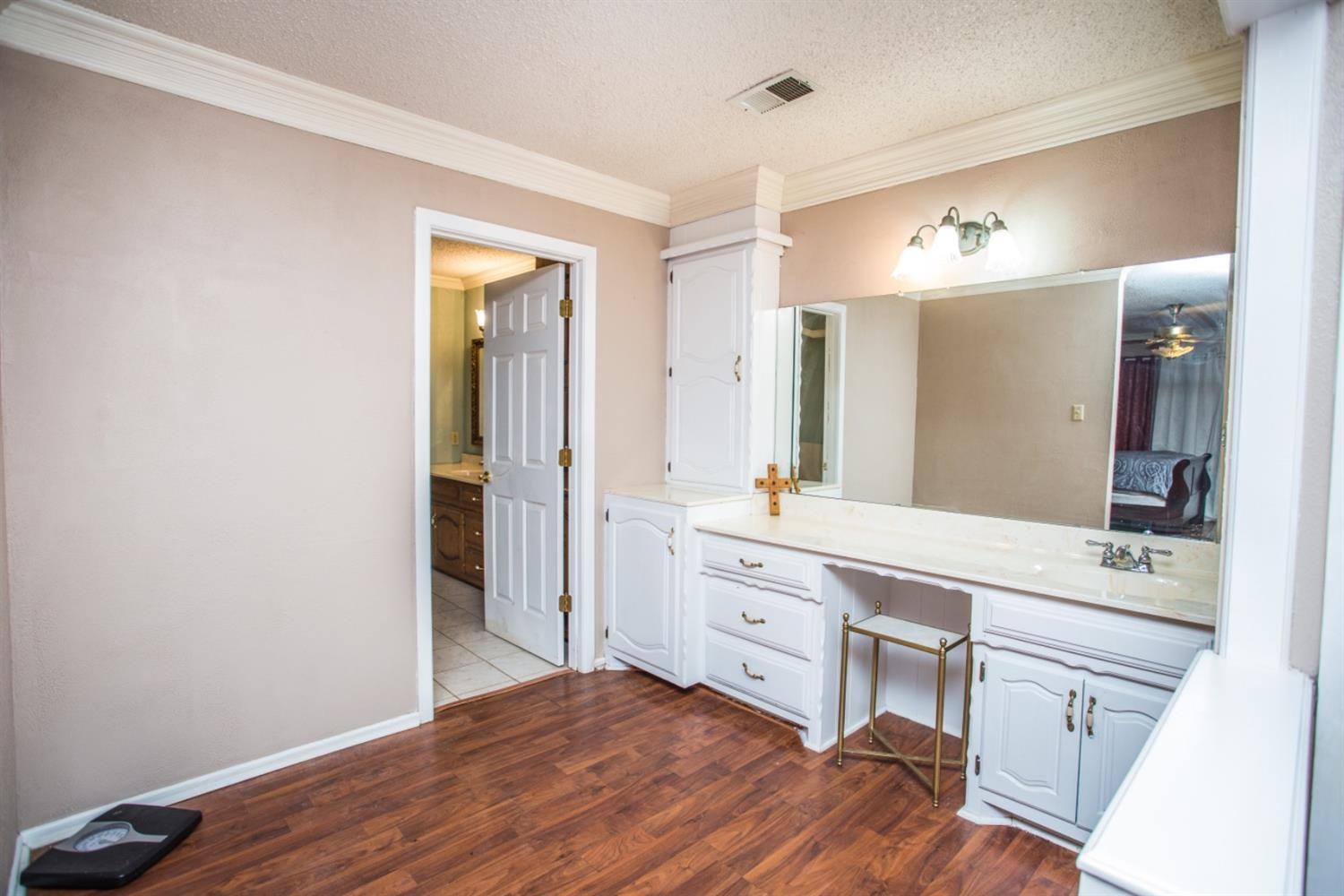 2118 Tech Drive Levelland, TX 79336 - Photo 41 of 42 a spacious bathroom with a vanity a sink a mirror and a shower