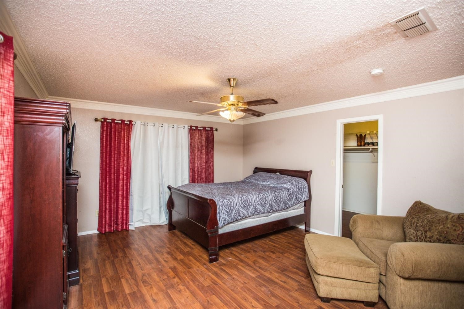 2118 Tech Drive Levelland, TX 79336 - Photo 42 of 42 a living room with furniture and a chandelier