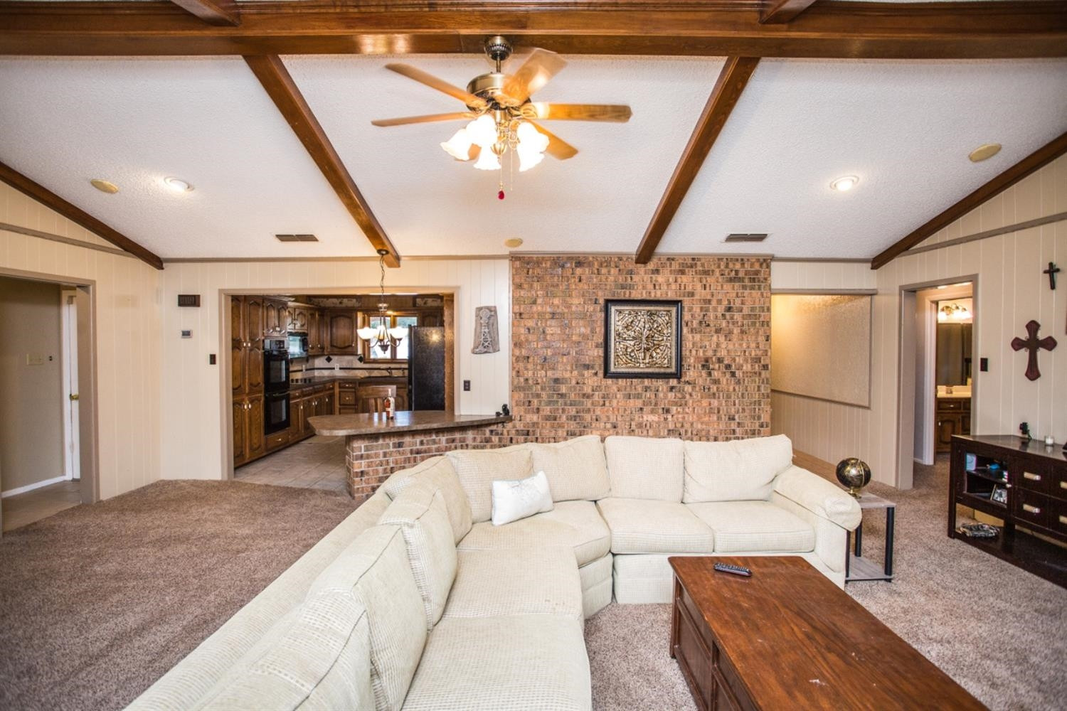 2118 Tech Drive Levelland, TX 79336 - Photo 8 of 42 a living room with furniture and a flat screen tv