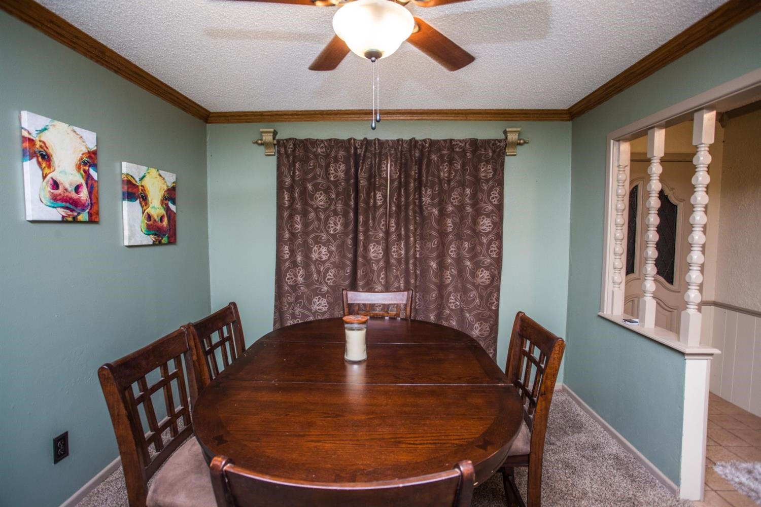 2118 Tech Drive Levelland, TX 79336 - Photo 10 of 42 a view of a dining room with furniture window and wooden floor