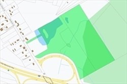 a view of a swimming pool with a yard