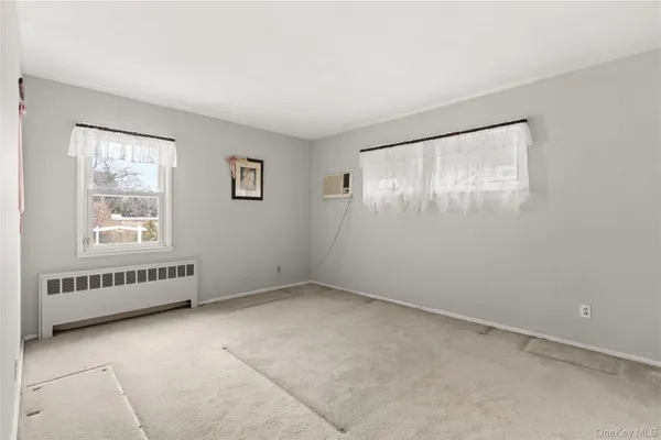 a kitchen with stainless steel appliances a stove a sink and a refrigerator