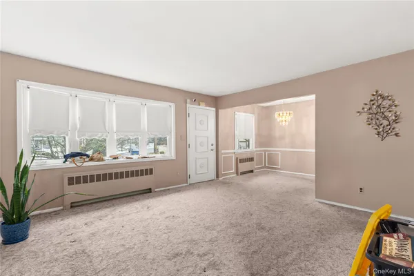 en empty room with windows