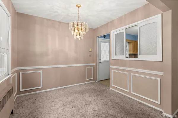 a kitchen with refrigerator a stove a microwave and cabinets