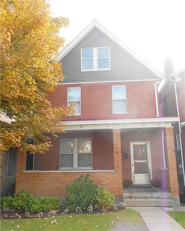 Solid, brick home on a quite, entry level street in the heart of The ROCKS!  Three levels of living in those five bedroom home!  Walk to shops, the schools, transportation and restaurants.  