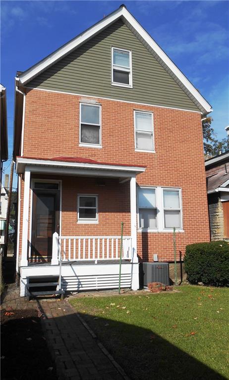 1165 Race Street McKees Rocks, PA 15136 - Photo 23 of 25 There is a small, covered porch off of the kitchen. This could be perfect for a grill or a little table and some chairs!