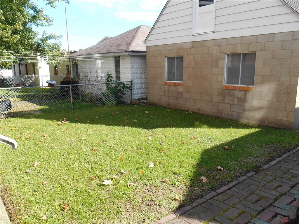1165 Race Street McKees Rocks, PA 15136 - Photo 24 of 25 Easy to maintain, flat and fenced back yard!