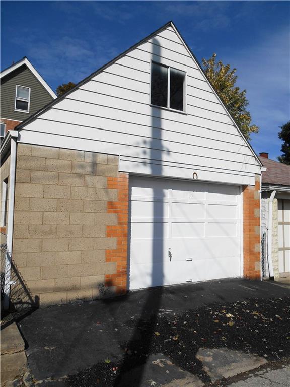 1165 Race Street McKees Rocks, PA 15136 - Photo 25 of 25 Over sized one car garage with storage above!