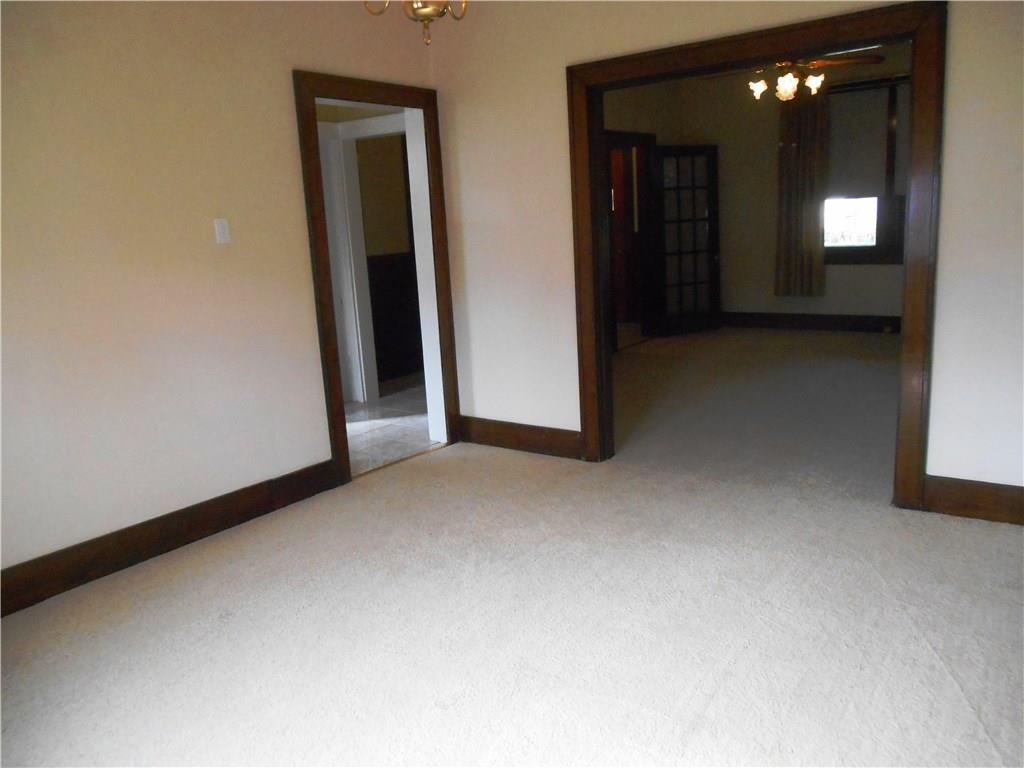 1165 Race Street McKees Rocks, PA 15136 - Photo 8 of 25 The kitchen is through the door to the left.