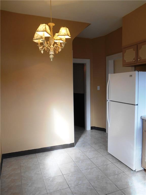 1165 Race Street McKees Rocks, PA 15136 - Photo 10 of 25 Extra space in the kitchen could be used for more storage or a little table and chairs.