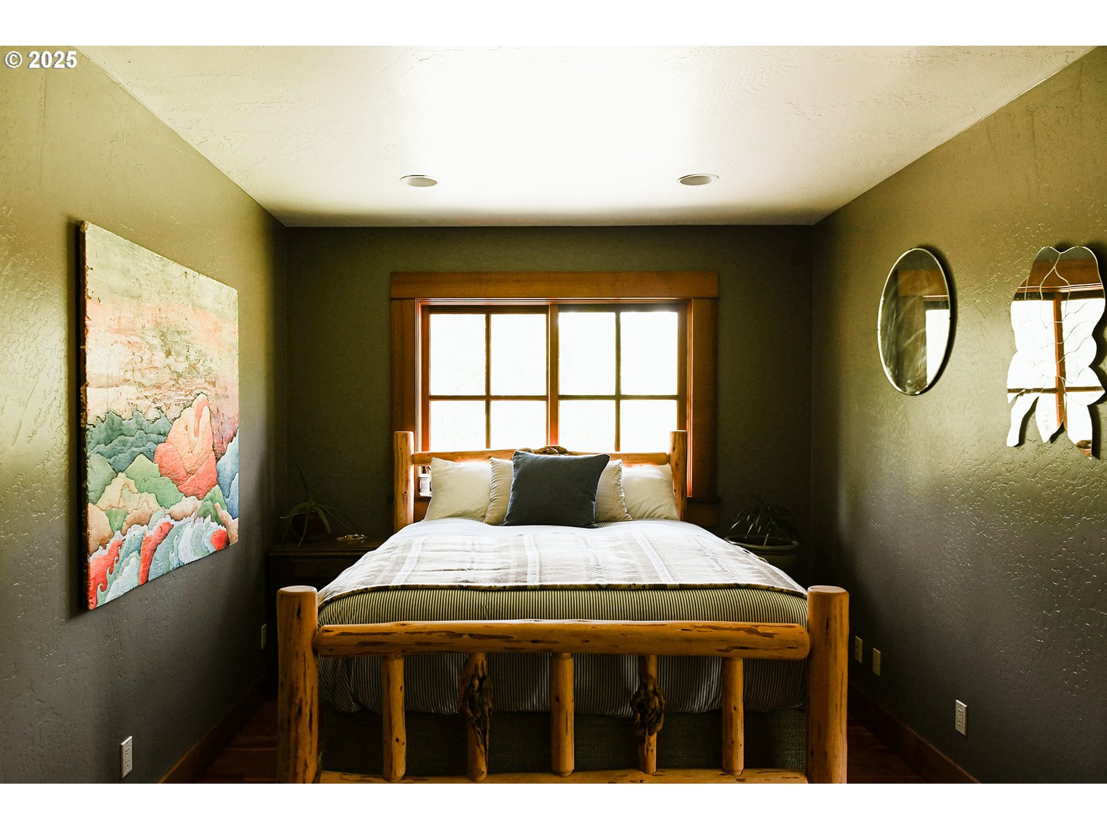 230 Jennings Road Trout Lake, WA 98650 - Photo 11 of 47 a bedroom with a bed and a window