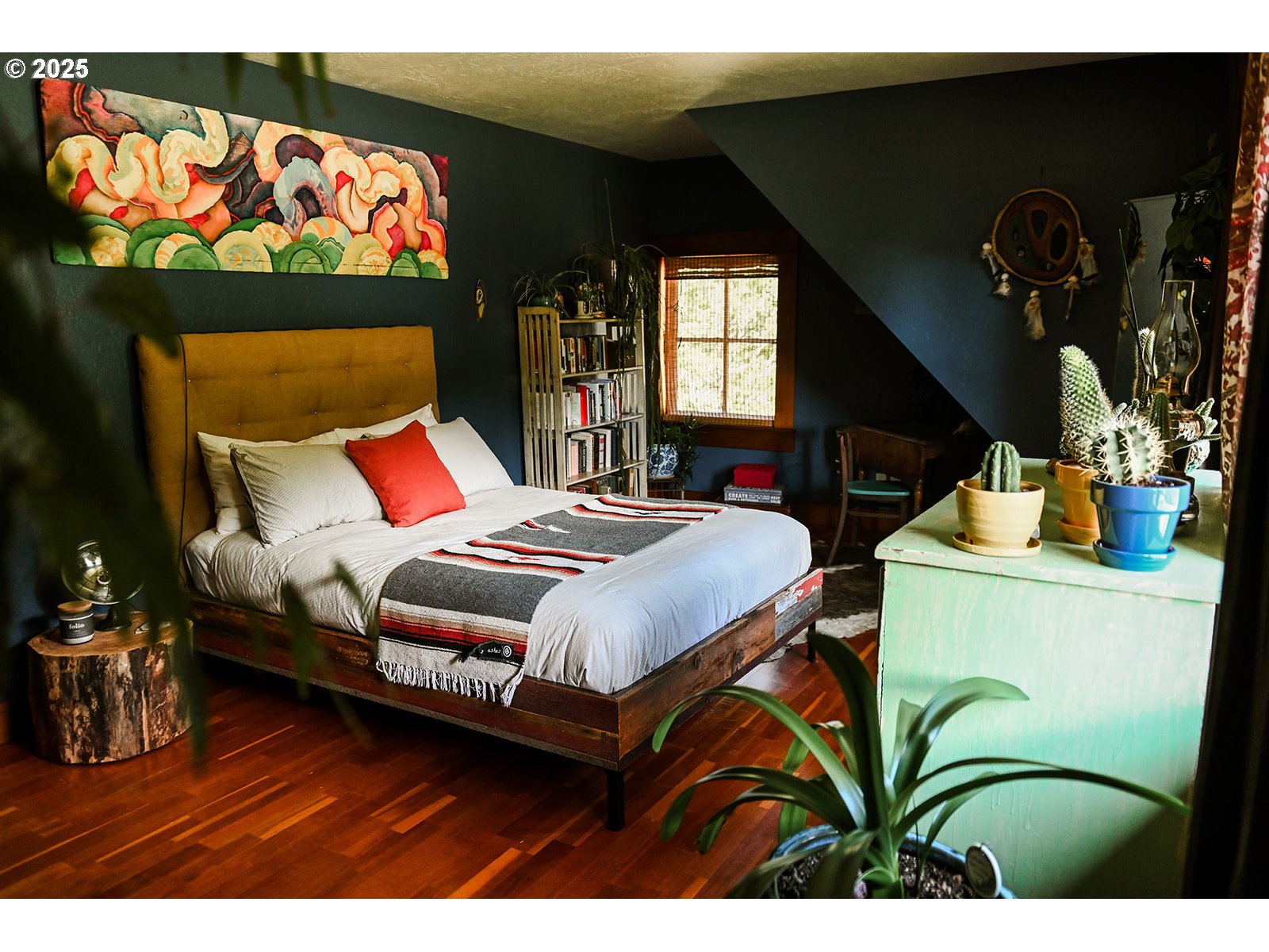 230 Jennings Road Trout Lake, WA 98650 - Photo 14 of 47 a bedroom with a bed and a painting on the wall