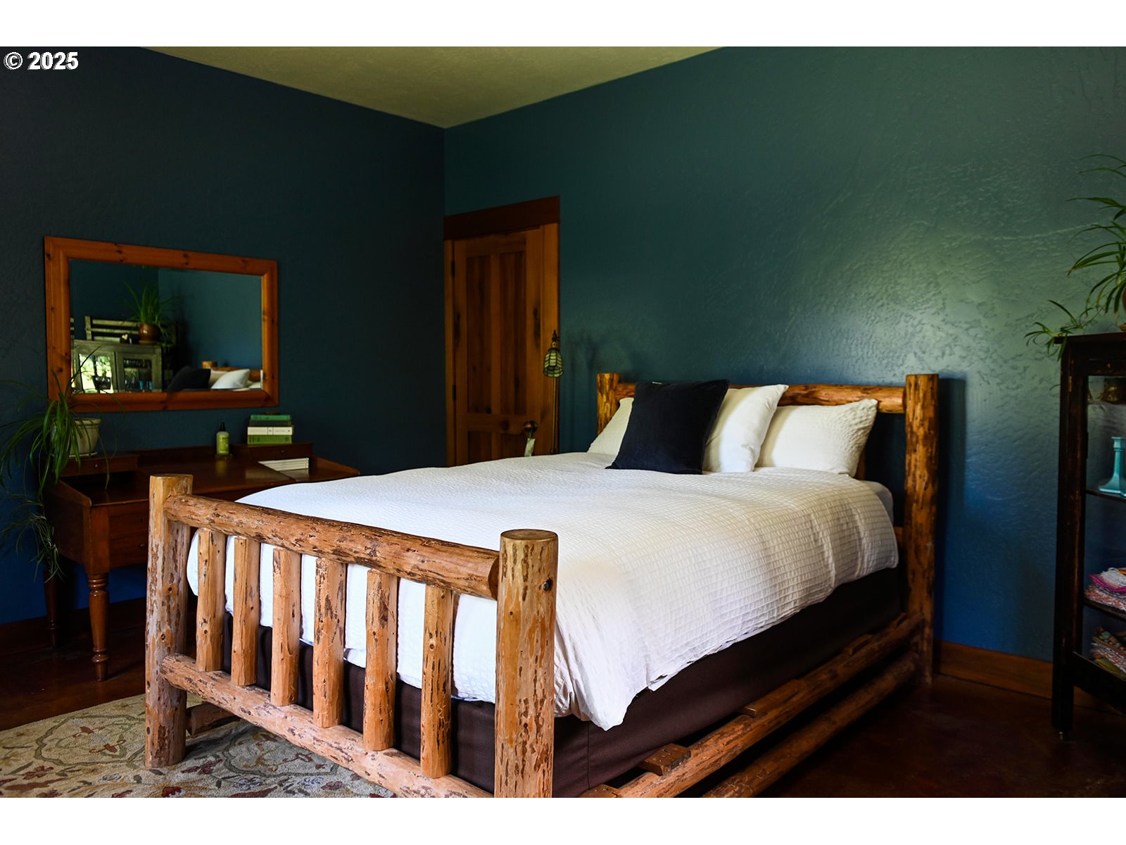 230 Jennings Road Trout Lake, WA 98650 - Photo 16 of 47 a bedroom with a bed and a dresser