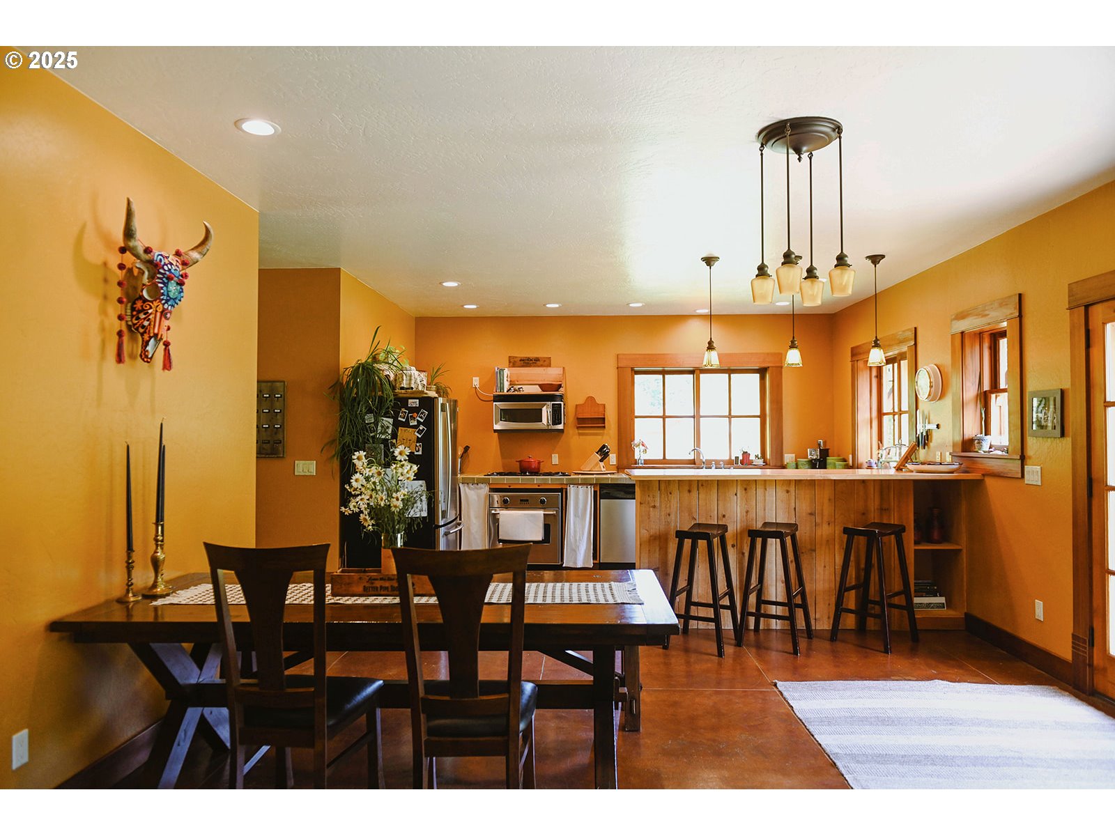 230 Jennings Road Trout Lake, WA 98650 - Photo 4 of 47 a dining room with furniture and wooden floor