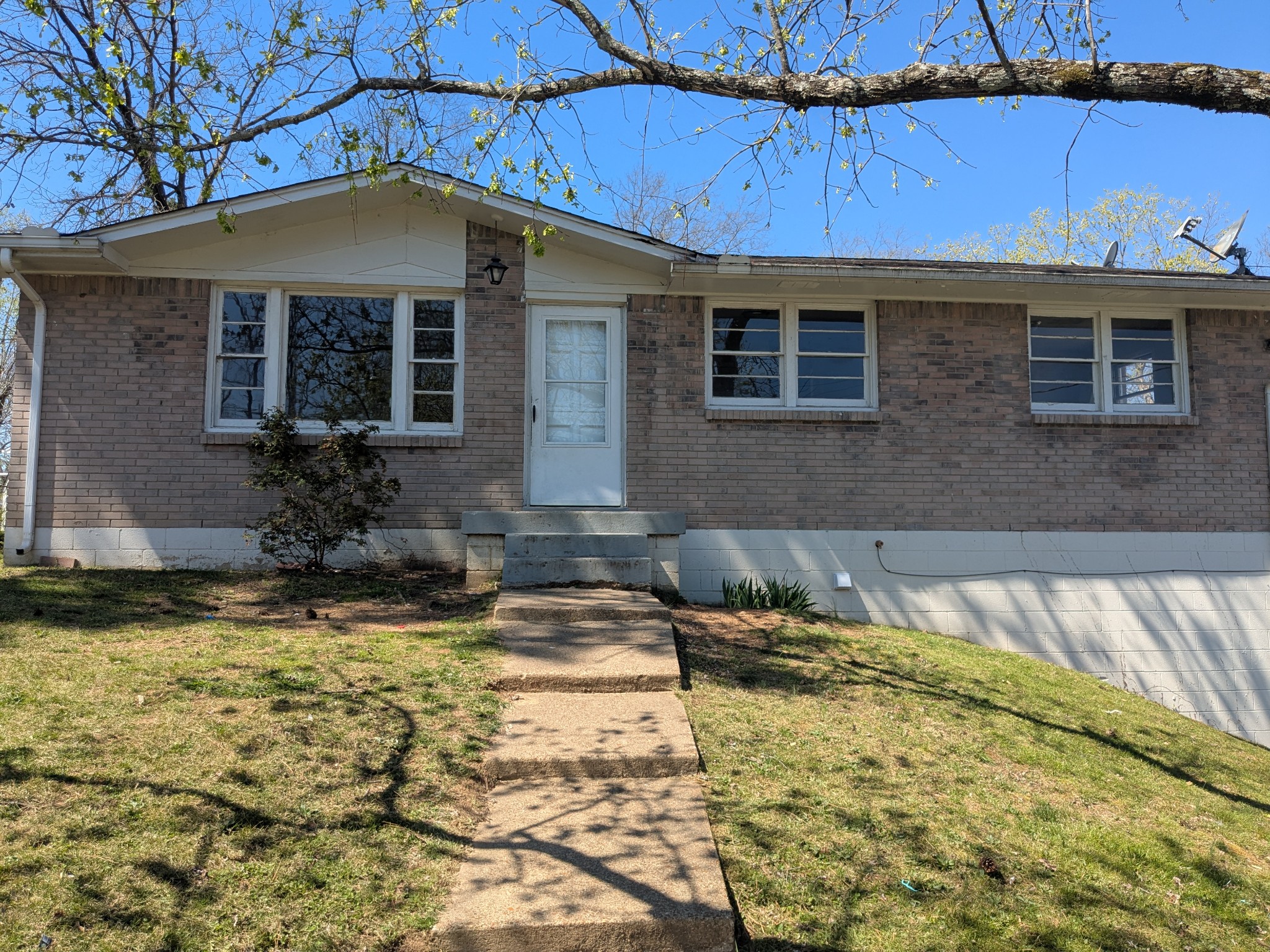 a view of a house with a swimming pool