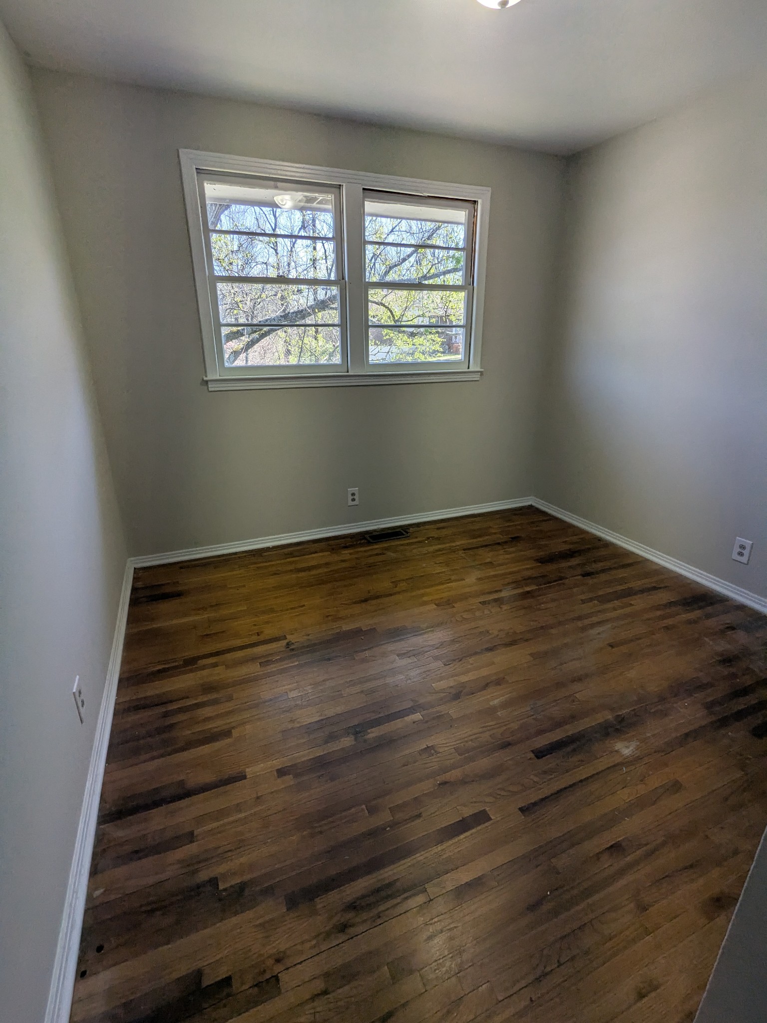 4721 McBride Road Antioch, TN 37013 - Photo 3 of 12 a view of wooden floor and windows in a room
