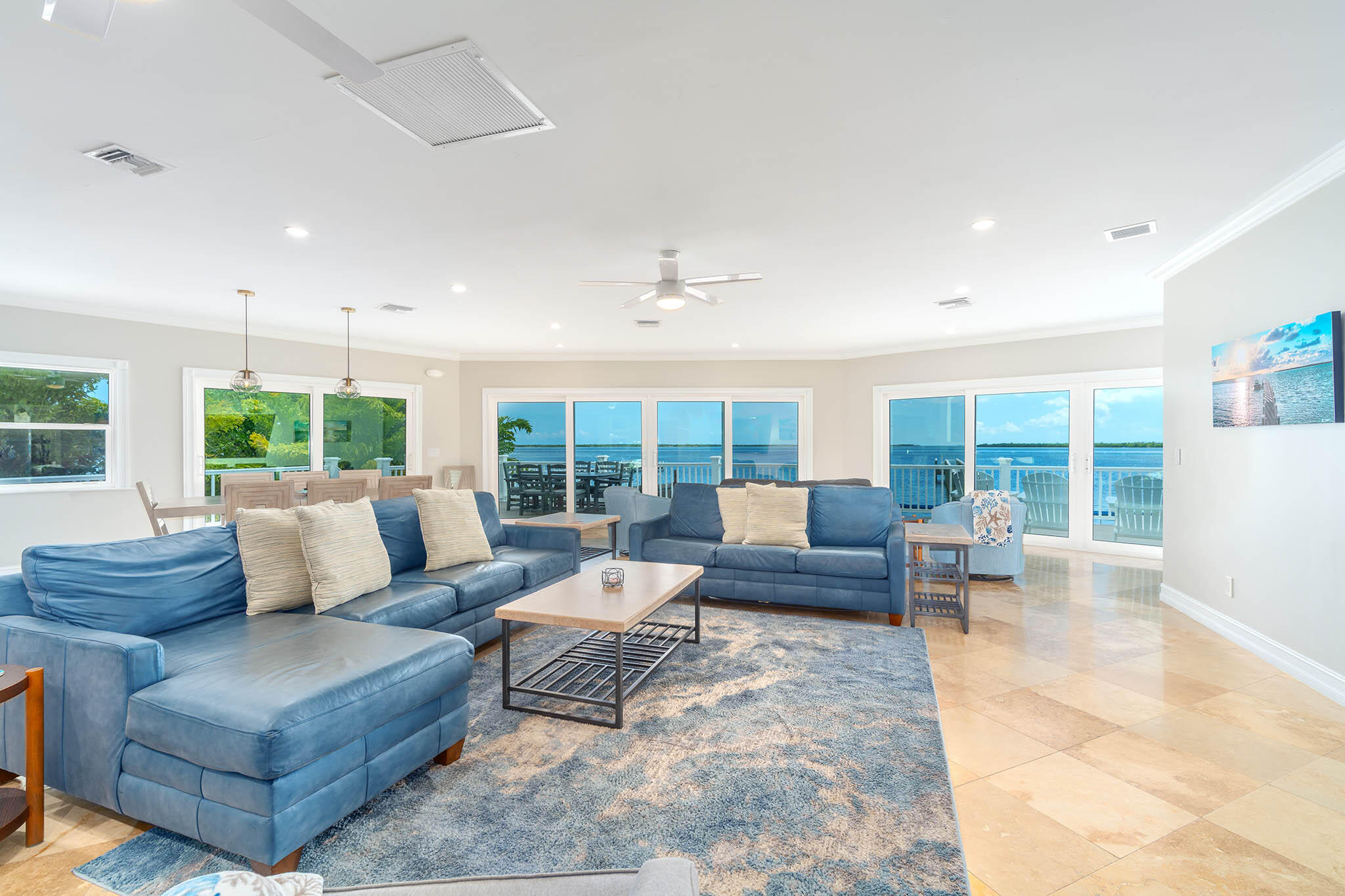 31473 Warner Street Big Pine Key, FL 33043 - Photo 18 of 49 a living room with furniture and a large window