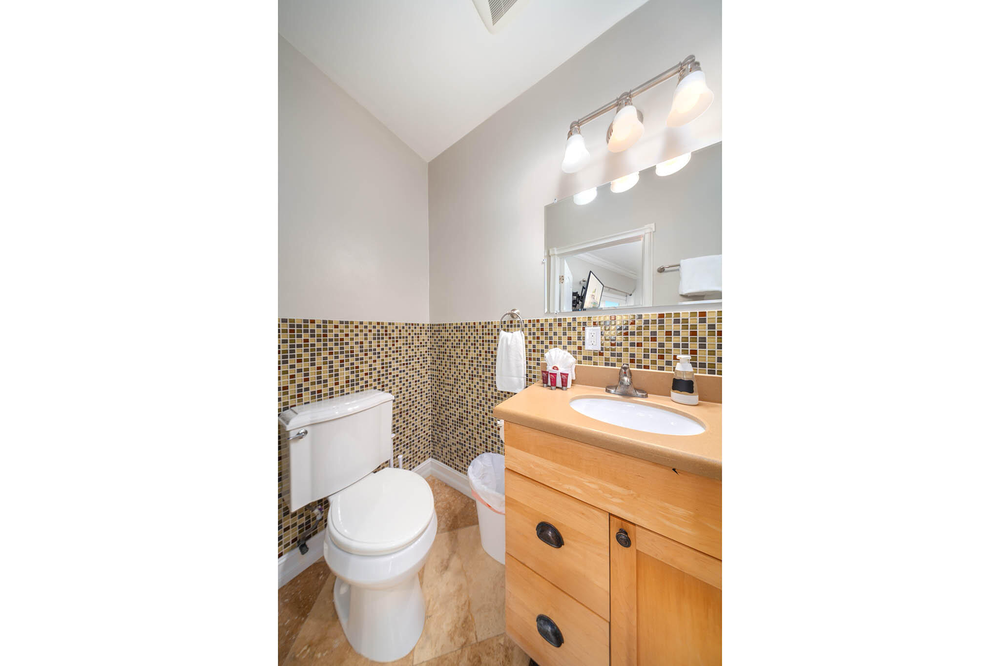 31473 Warner Street Big Pine Key, FL 33043 - Photo 24 of 49 a bathroom with a sink a toilet and a mirror