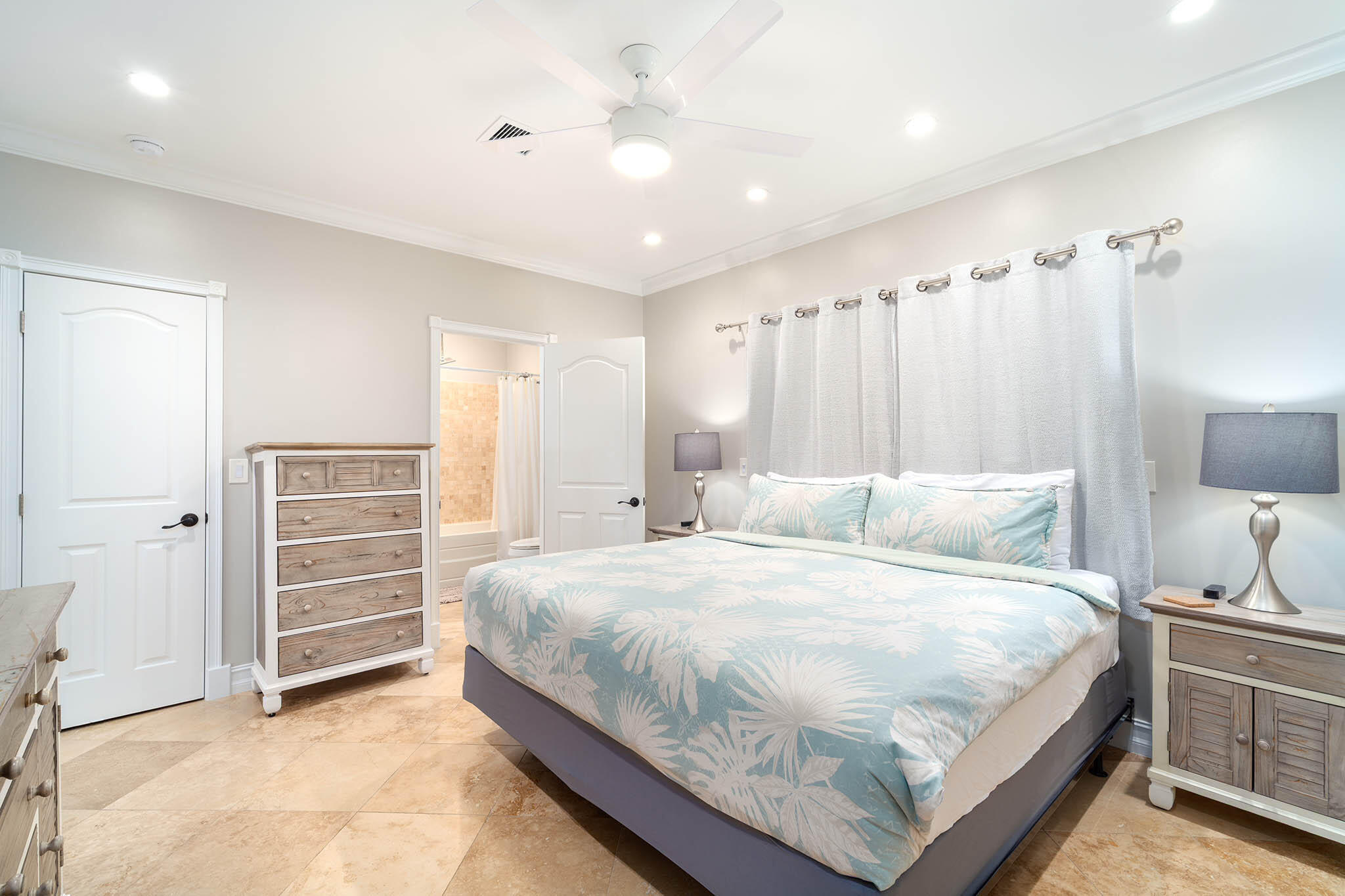 31473 Warner Street Big Pine Key, FL 33043 - Photo 30 of 49 a bedroom with a bed and a view of walk in closet