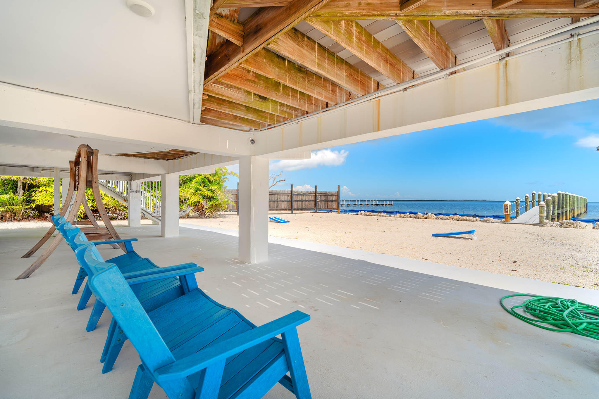 31473 Warner Street Big Pine Key, FL 33043 - Photo 41 of 49 a view of a patio with a table and chairs