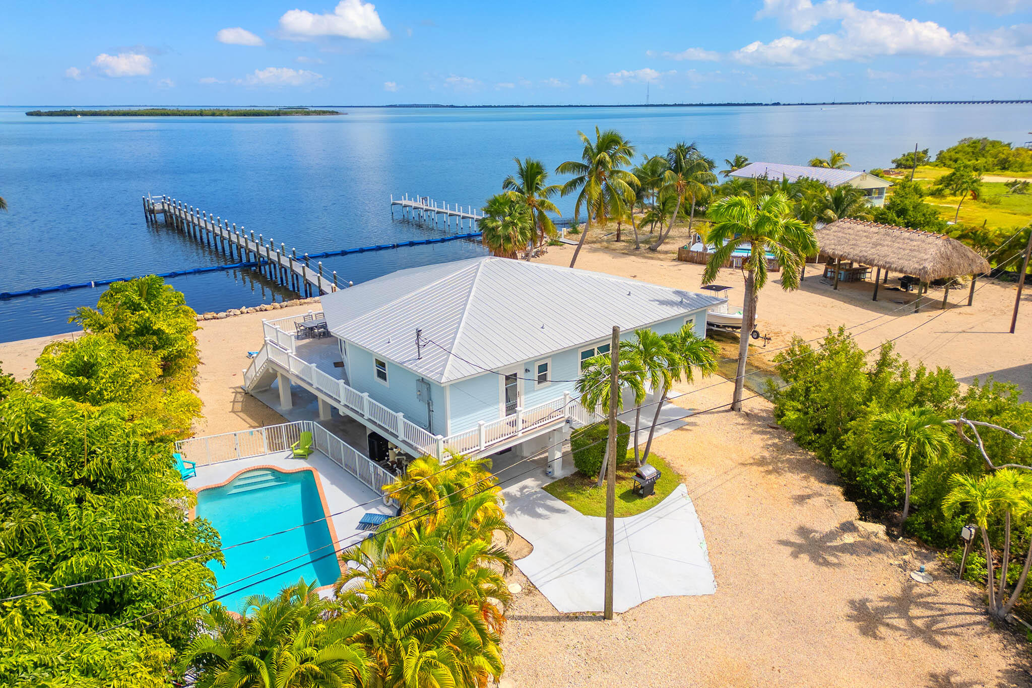 31473 Warner Street Big Pine Key, FL 33043 - Photo 7 of 49 a view of a swimming pool with a yard