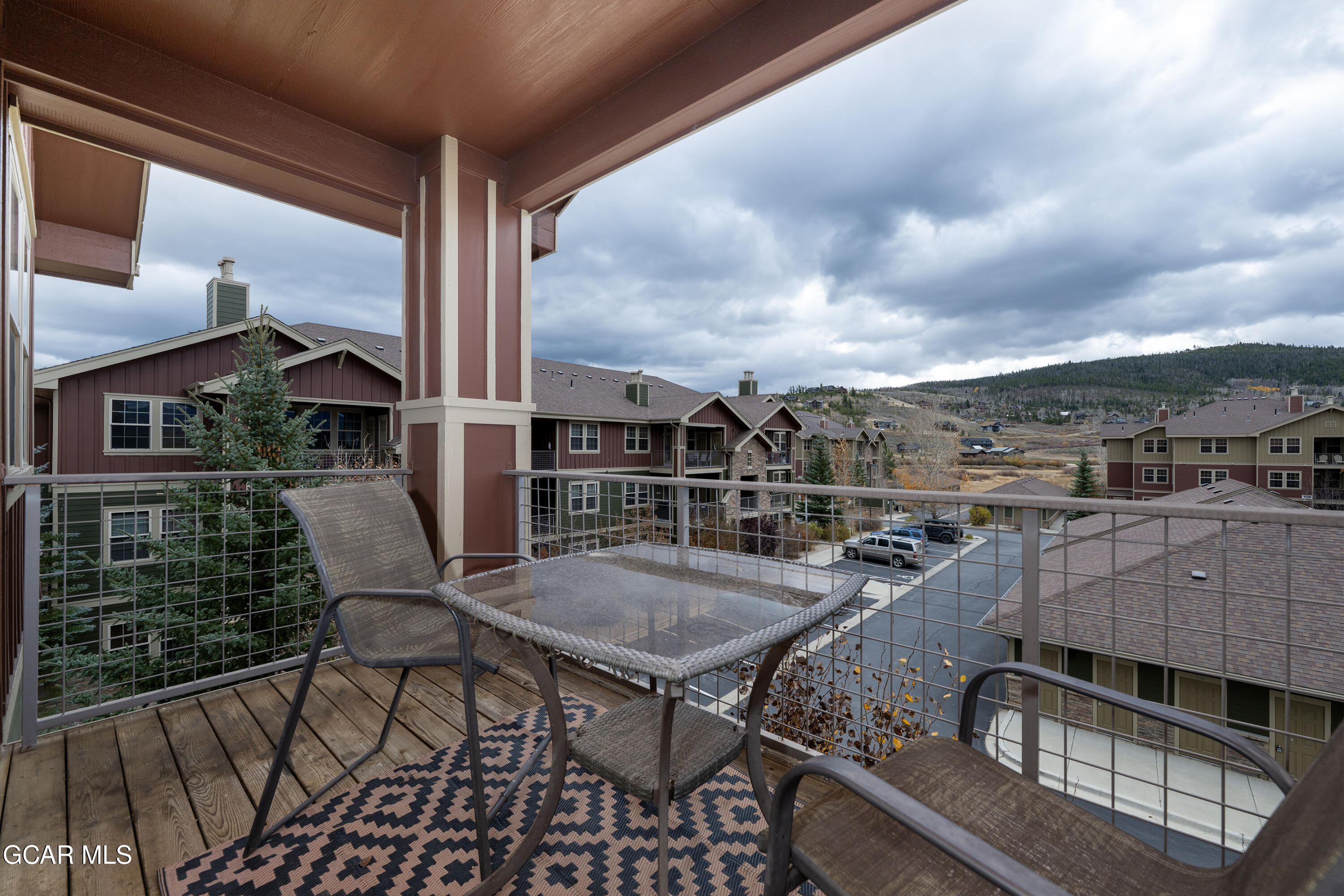 150 Village Road, Unit A307 Granby, CO 80446 - Photo 2 of 34 a view of a balcony with furniture