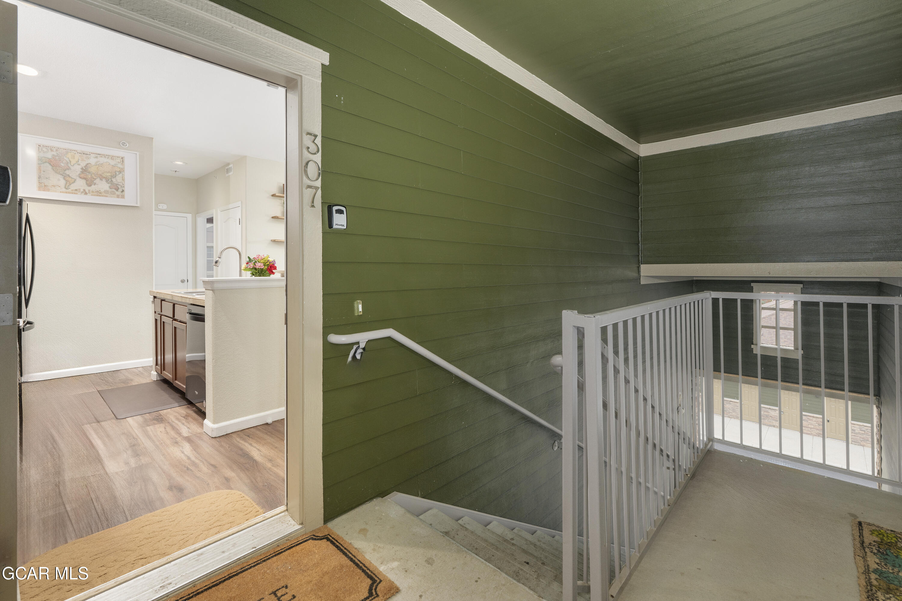 150 Village Road, Unit A307 Granby, CO 80446 - Photo 21 of 34 a view of a hallway with a living room
