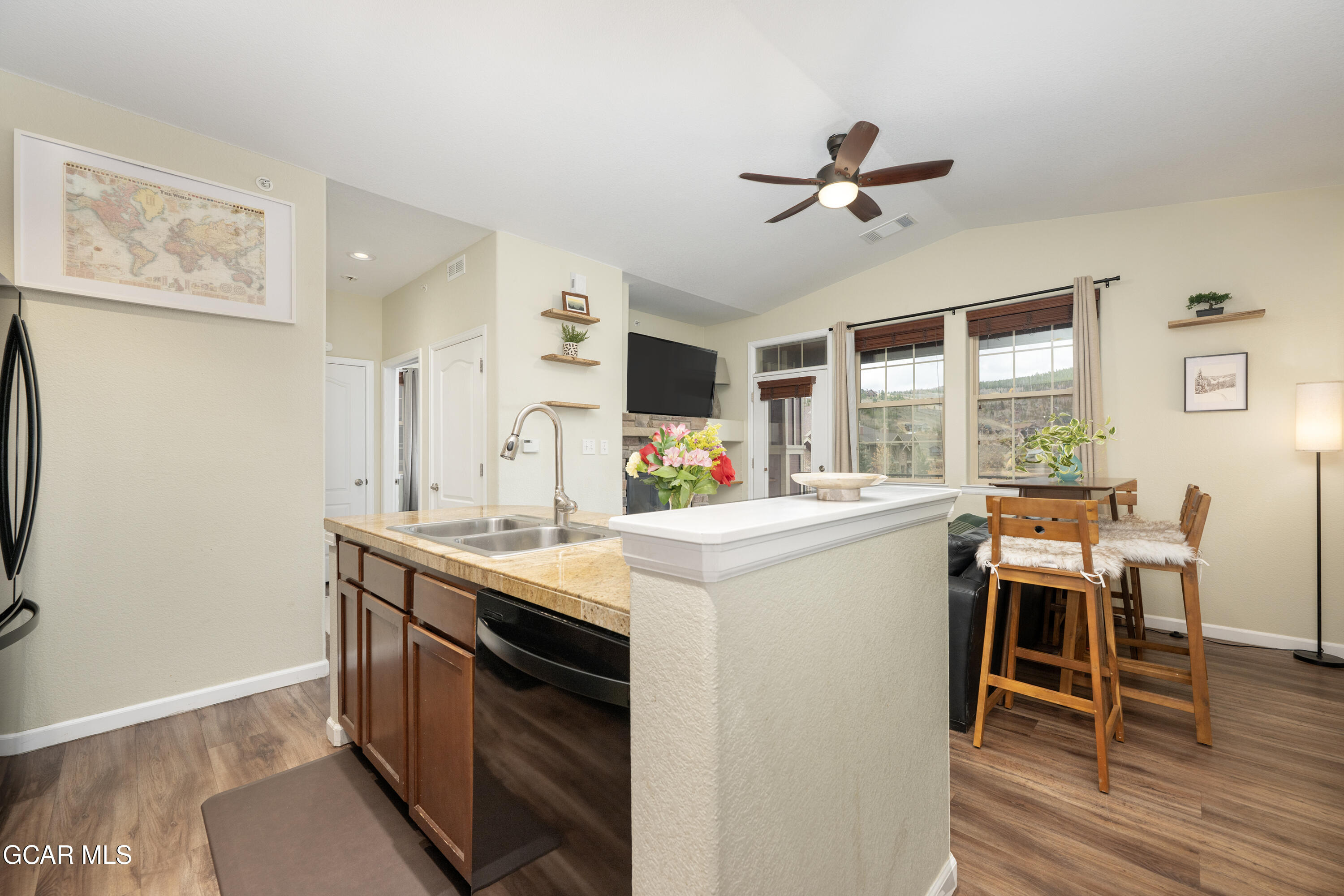 150 Village Road, Unit A307 Granby, CO 80446 - Photo 5 of 34 a view of kitchen with sink and wooden floor