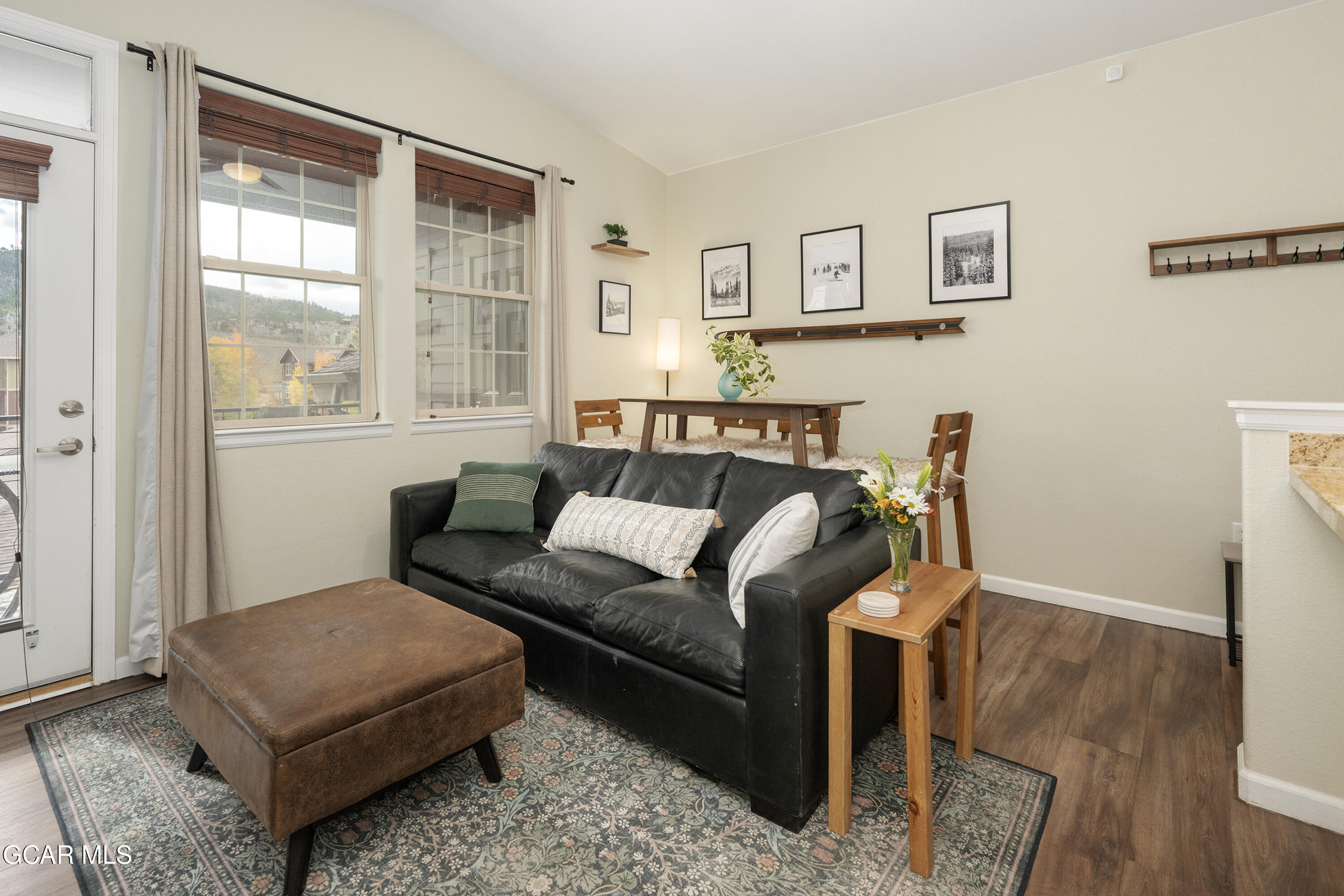 150 Village Road, Unit A307 Granby, CO 80446 - Photo 7 of 34 a living room with furniture and a window