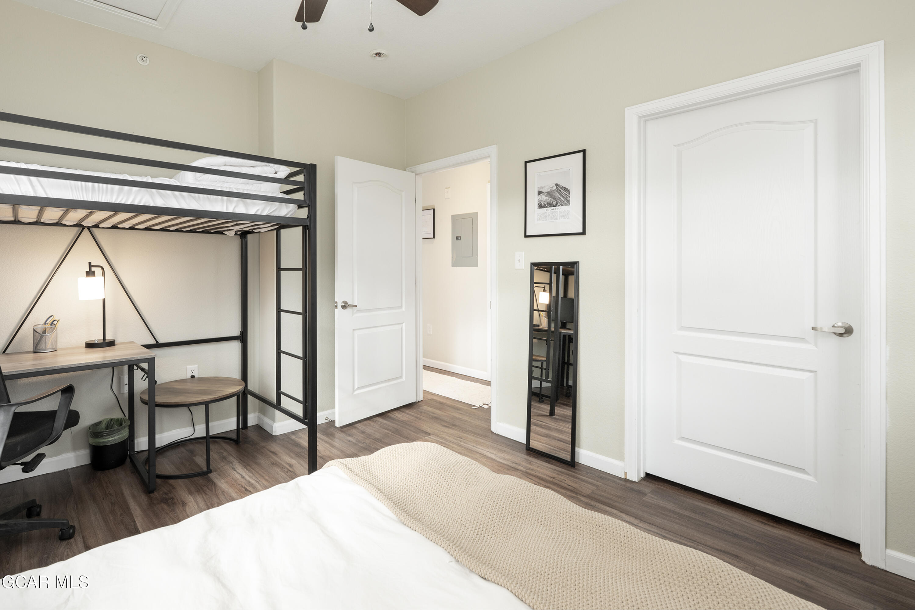 150 Village Road, Unit A307 Granby, CO 80446 - Photo 10 of 34 a bedroom with a bed and a window