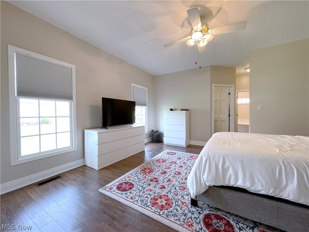718 Sunridge Road Fairlawn, OH 44333 - Photo 14 of 49 Bedroom featuring dark hardwood / wood-style floors, ceiling fan, and multiple windows