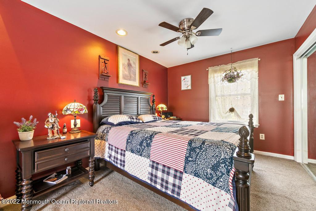 112 Bowsprit Road Manahawkin, NJ 08050 - Photo 27 of 47 a bedroom with a bed a window and dresser