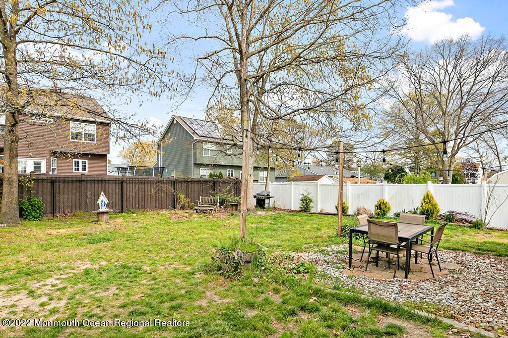 112 Bowsprit Road Manahawkin, NJ 08050 - Photo 47 of 47 a view of a house with backyard and a tree