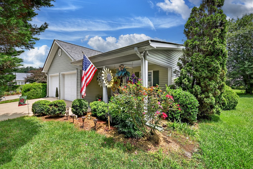 66 Westward Lane Blue Ridge, GA 30513 - Photo 2 of 34 a view of a house with a yard and garden