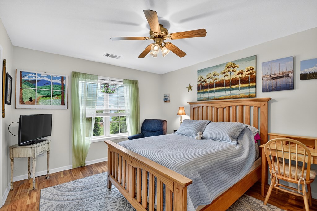 66 Westward Lane Blue Ridge, GA 30513 - Photo 21 of 34 a bedroom with furniture and a window