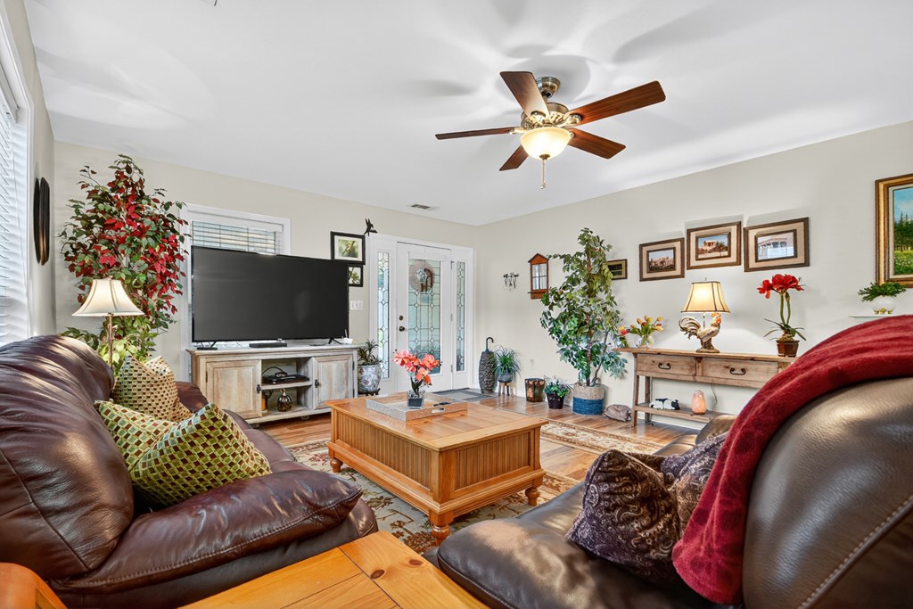 66 Westward Lane Blue Ridge, GA 30513 - Photo 29 of 34 a living room with furniture and a flat screen tv