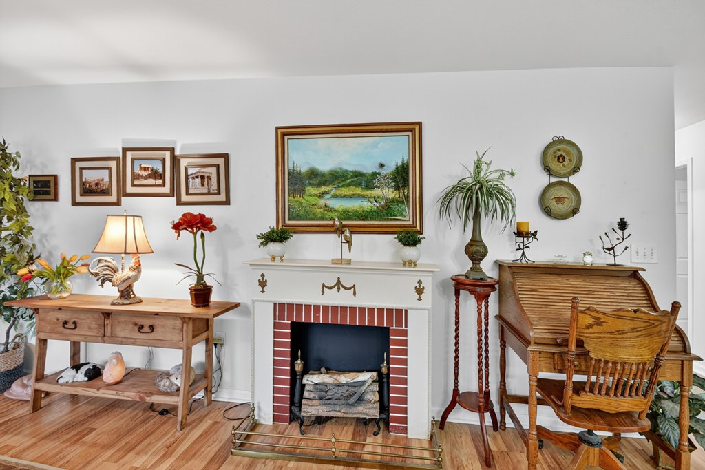 66 Westward Lane Blue Ridge, GA 30513 - Photo 10 of 34 a living room with a couch and a fireplace