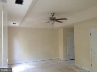 519 Koch Road Linthicum Heights, MD 21090 - Photo 13 of 29 Tray ceiling and ceiling fan