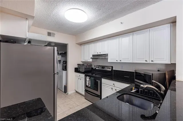 $225,000 | 8225 Ibis Club Drive, Unit 203, Naples, FL 34104