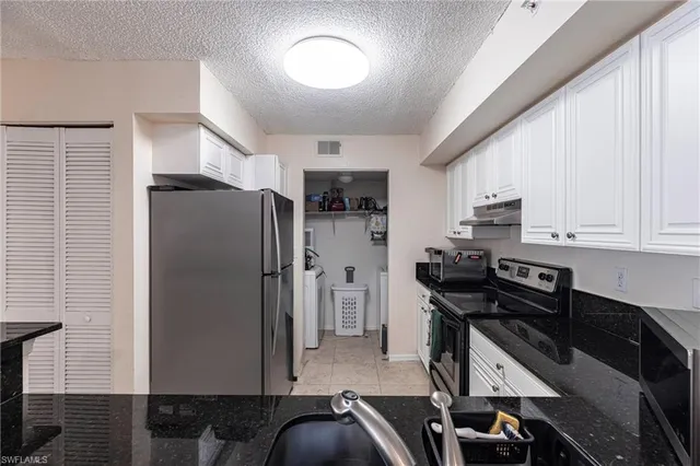 $225,000 | 8225 Ibis Club Drive, Unit 203, Naples, FL 34104