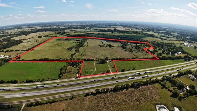 an aerial view of a highlighted house