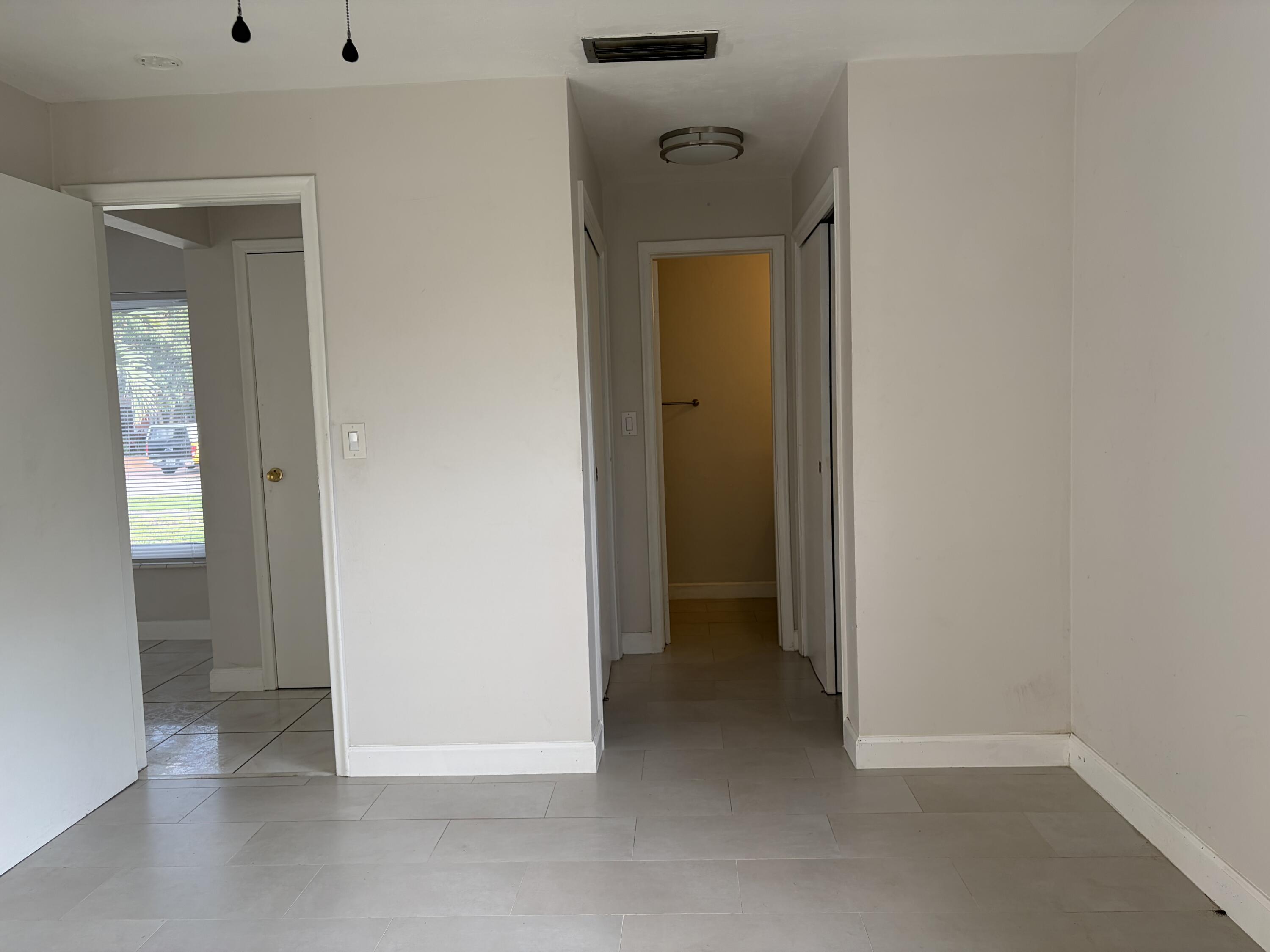 6691 Northwest 30th Street Sunrise, FL 33313 - Photo 17 of 26 a view of an entryway and a room