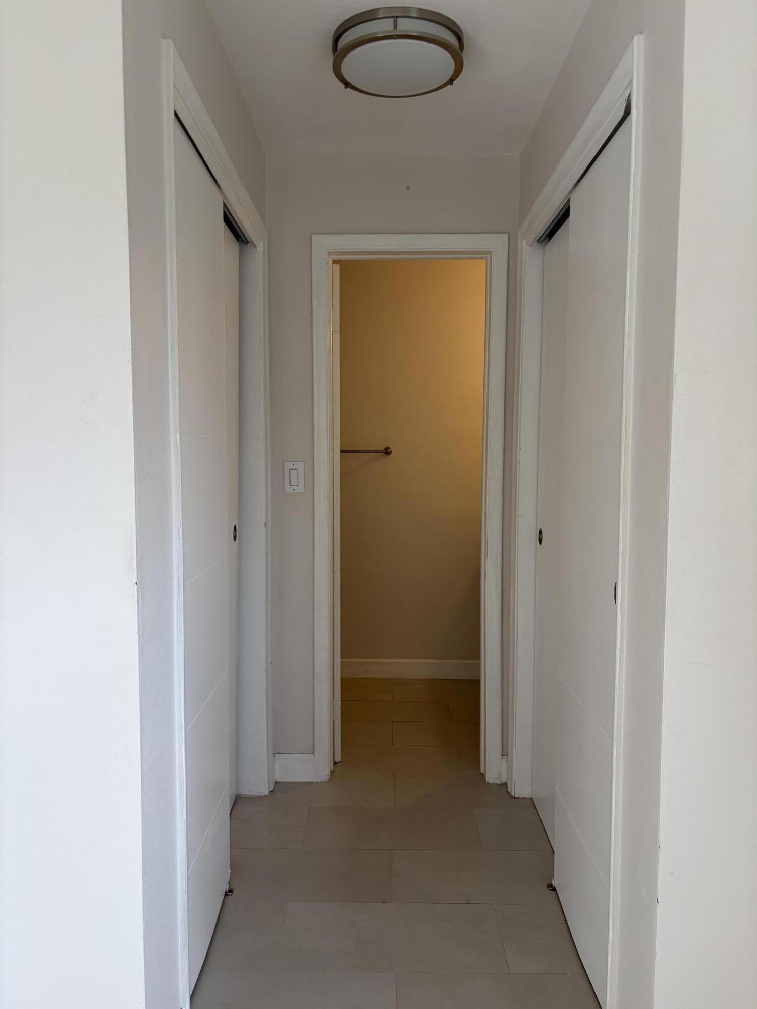 6691 Northwest 30th Street Sunrise, FL 33313 - Photo 18 of 26 a view of hallway with shower