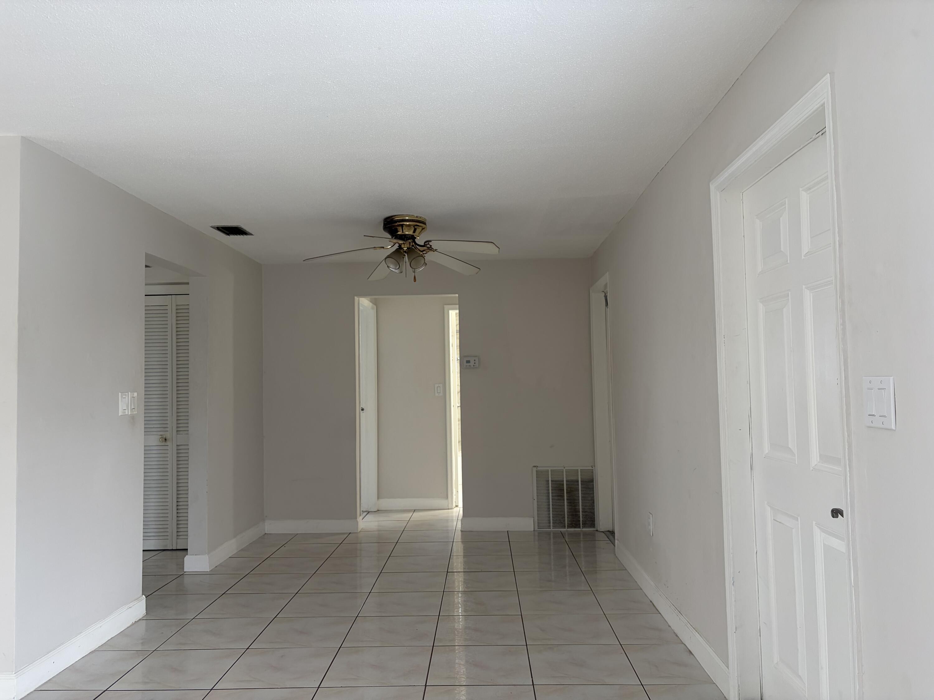 6691 Northwest 30th Street Sunrise, FL 33313 - Photo 7 of 26 a view of an empty room