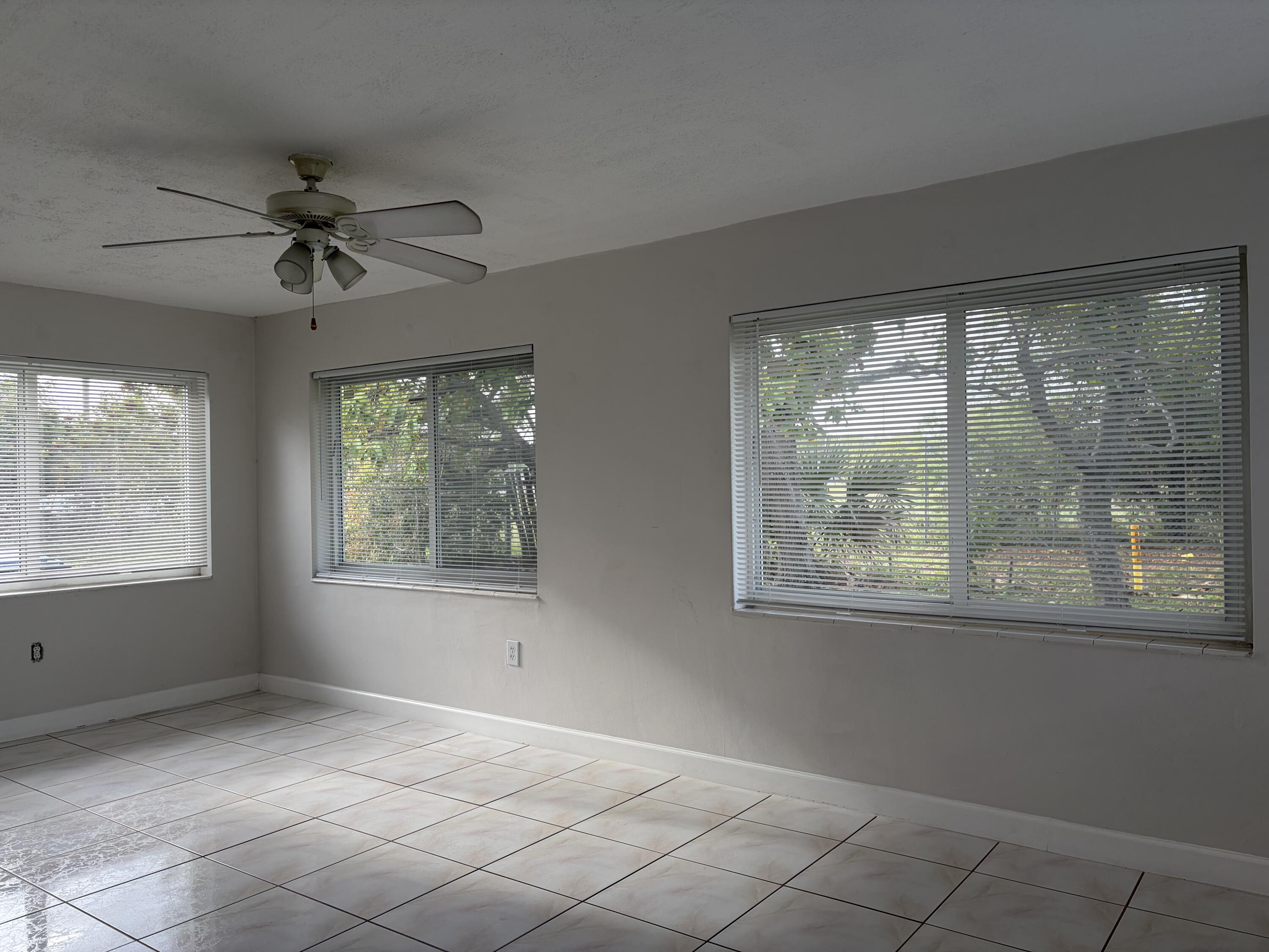 6691 Northwest 30th Street Sunrise, FL 33313 - Photo 9 of 26 a view of an empty room with a window