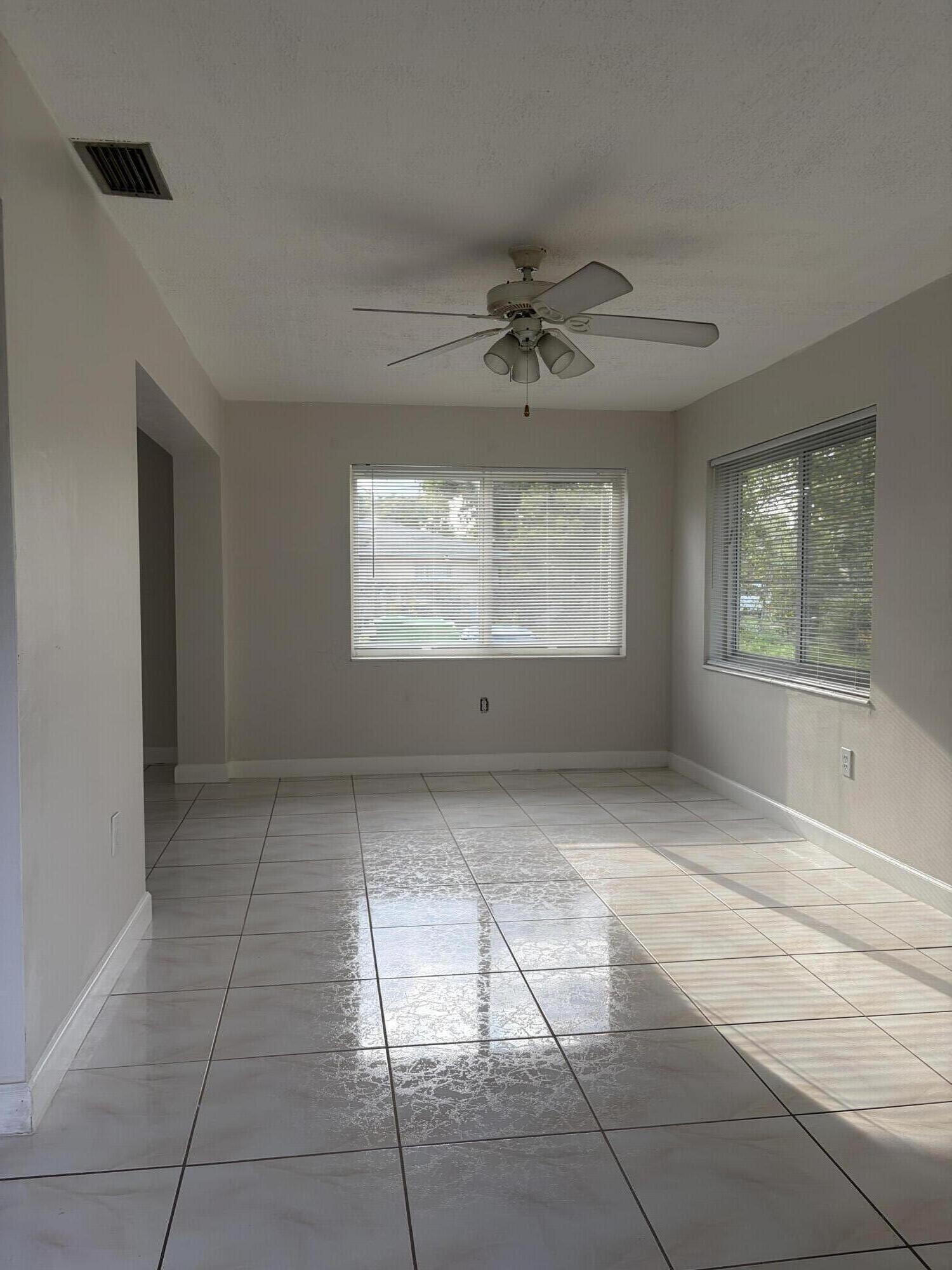 6691 Northwest 30th Street Sunrise, FL 33313 - Photo 10 of 26 a view of an empty room with a window