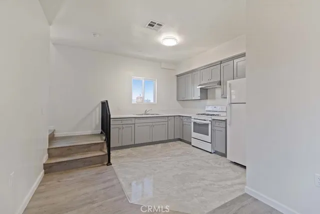 an empty room with closet area