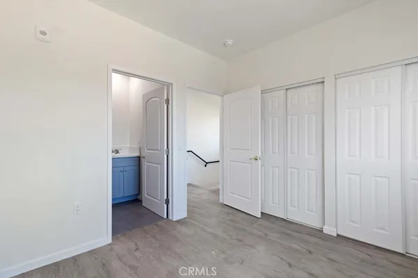 a bathroom with a sink toilet and a mirror